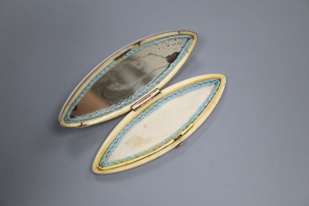 An oval ivory and yellow metal toothpick case